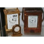 A LATE VICTORIAN BRASS CASED CARRIAGE CLOCK IN ORIGINAL LEATHER OUTER CASE, A LATER WOODFORD