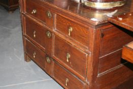 AN EARLY 18TH.C.OAK PANEL FRONT CHEST OF DRAWERS