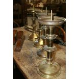 A SET OF FOUR LARGE VICTORIAN PRICKET CANDLESTICKS