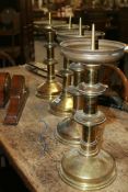 A SET OF FOUR LARGE VICTORIAN PRICKET CANDLESTICKS