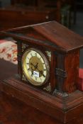 A LATE VICTORIAN MANTLE CLOCK