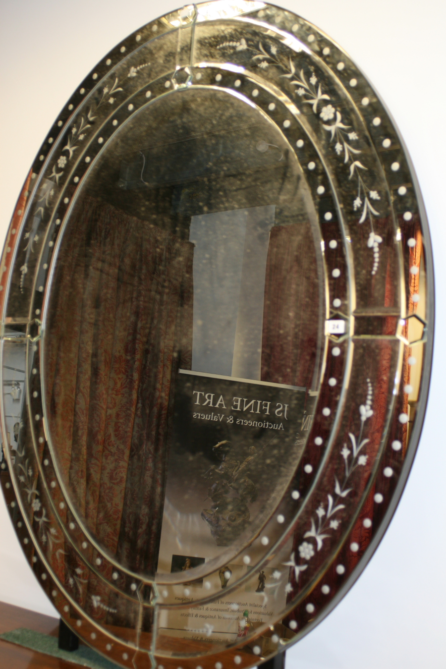 A VIENNA STYLE LARGE OVAL MIRROR