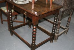 AN 18TH.C.OAK SIDE TABLE WITH FRIEZE DRAWER