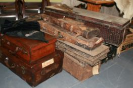 TWO ANTIQUE LEATHER SUITCASES, VARIOUS GUN CASES, UNIFORM CHESTS,ETC