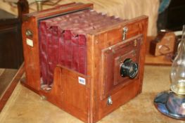 AN UNUSUAL FULL PLATE MAHOGANY AND BRASS STUDIO CAMERA BY MEAGHER AND FITTED WITH ROSS LENS