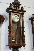 A VICTORIAN VIENNA REGULATOR WALL CLOCK WITH ELABORATE CARVED CASE