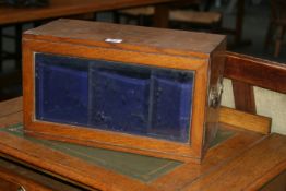 AN OAK TABLE CABINET