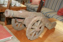 A PAIR OF CAST IRON ORNAMENTAL CANON