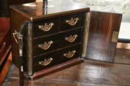 A VICTORIAN COROMADEL AND BRASS INLAID TABLE CABINET