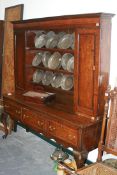 AN 18TH.C.OAK AND MAHOGANY BANDED DRESSER AND PLATE RACK