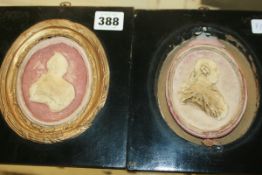 A PAIR OF RELIEF PORTRAIT PLAQUES