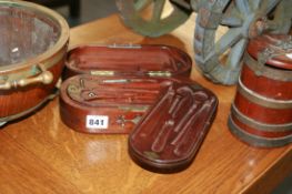 A MAHOGANY CAMPAIGN GENTLEMAN'S NECCESSAIRE TOGETHER WITH A BRASS BOUND TEAK MINIATURE BARREL AND