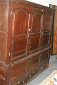 A LARGE 18TH.C.OAK PANELLED HALL CUPBOARD