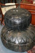TWO LARGE LEATHER POUFFE