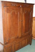 AN 18TH.C.OAK LIVERY OR HALL CABINET DATED 1738