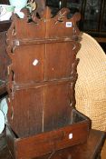 AN ANTIQUE OAK SPOON RACK