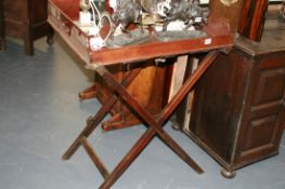 A GEORGIAN MAHOGANY BUTLER'S TRAY ON STAND