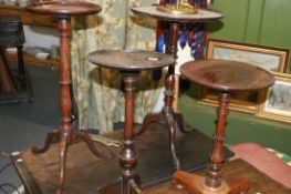 FOUR MAHOGANY TRIPOD OCCASIONAL TABLES