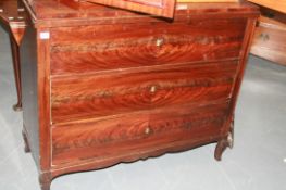 A CONTINENTAL MAHOGANY THREE DRAWER CHEST