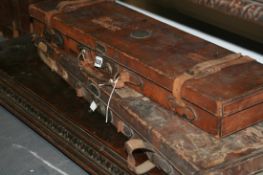 TWO ANTIQUE LEATHER GUN CASES