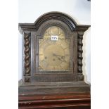 AN EARLY 20TH.C.OAK CASED BRACKET CLOCK WITH THREE TRAIN STRIKING MOVEMENT AND BRASS DIAL