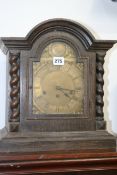 AN EARLY 20TH.C.OAK CASED BRACKET CLOCK WITH THREE TRAIN STRIKING MOVEMENT AND BRASS DIAL