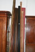 A LARGE COLLECTION OF CURTAIN POLES AND RAILS