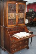 A GEO.III. MAHOGANY BUREAU BOOKCASE WITH ASTRAGAL GLAZED DOORS