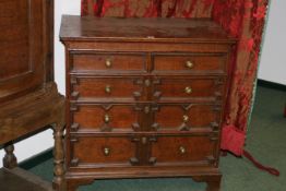 AN 18TH.C.OAK CHEST OF DRAWERS WITH GEOMETRIC PANEL DRAWER FRONTS