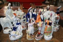 A COLLECTION OF STAFFORDSHIRE FLAT BACK FIGURES