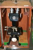 A VINTAGE BINOCULAR MICROSOPE BY BAKER OF LONDON