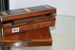 TWO TRAVELLING CHESS SETS AND AN IVORY INLAID GLOVE BOX