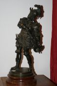 A 19TH.C.SPELTER FIGURE OF A MEDIEVAL SWORDSMAN