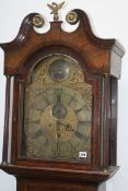 A GEORGIAN OAK AND MAHOGANY EIGHT DAY LONG CASE CLOCK WITH BRASS ARCH DIAL SIGNED JOHN GREENALL,