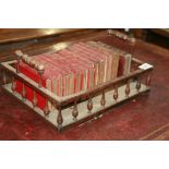 A SMALL REGENCY ROSEWOOD BOOK CARRIER