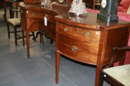 A LARGE GEORGIAN MAHOGANY INVERTED BOW FRONT SIDEBOARD/SERVER