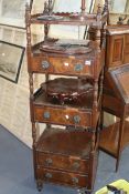 A GEORGIAN MAHOGANY FOUR TIER WHAT-NOT WITH FOUR DRAWERS