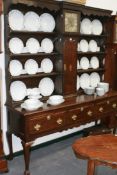 AN 18TH.C.OAK DRESSER THE PLATE RACK CENTRED WITH LONG CASE CLOCK ADAPTED WITH FUSEE MOVEMENT