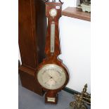 A LARGE REGENCY FLAME MAHOGANY AND EBONY BANDED FOUR GLASS BANJO BAROMETER SIGNED CACANTI ,TOWN