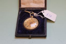 AN 18CT.GOLD OPEN FACED DRESS WATCH WITH CHASED BACK PLATE IN FITTED CASE.   £200-300