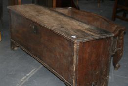 AN EARLY 18TH.C.ELM SIX PANEL COFFER WITH APPLIED MOULDINGS