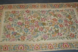 A SMALL NEEDLEPOINT TYPE RUG