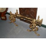 A SET OF VICTORIAN BRASS FIRE IMPLEMENTS AND DOGS