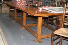 A VERY LARGE HEAL'S GOLDEN OAK REFECTORY TABLE