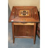 A COLONIAL TEAK AND INLAID GAMES TABLE