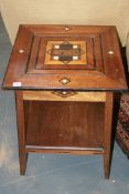 A COLONIAL TEAK AND INLAID GAMES TABLE