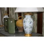 A PAIR OF PORCELAIN TABLE LAMPS, TWO STONE JARS AND A PAIR OF VASES