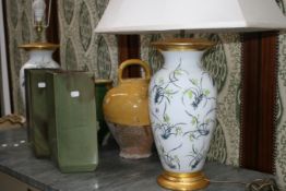 A PAIR OF PORCELAIN TABLE LAMPS, TWO STONE JARS AND A PAIR OF VASES
