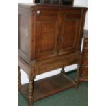 AN EARLY 18TH.C.OAK CABINET ON STAND