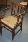 A REGENCY MAHOGANY OPEN ARMCHAIR